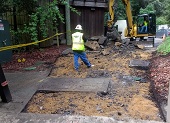 Demolition of path to make way for new electrical services.